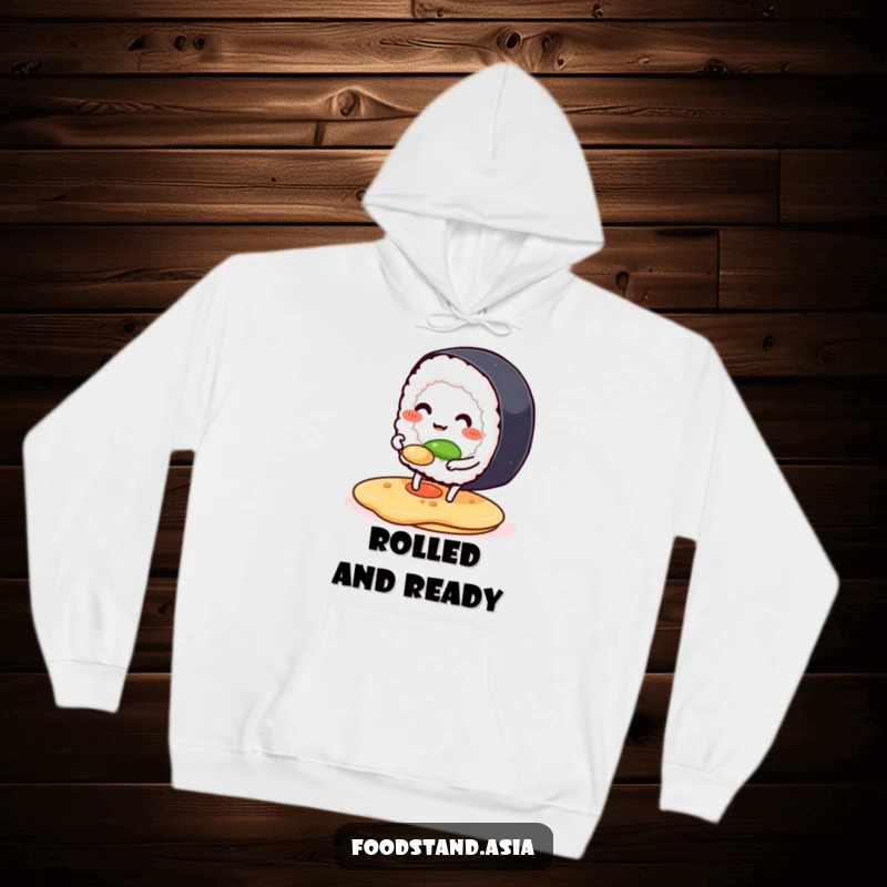 Funny hoodie depicting a smiling sushi roll with legs flipping a pancake, offering warmth and a humorous culinary vibe.