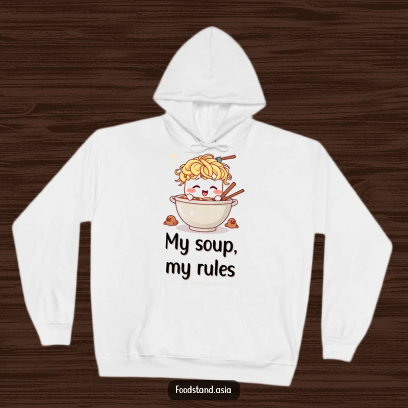 Funny hoodie featuring a laughing ramen bowl with noodle strands for hair, actively stirring a large cooking pot.
